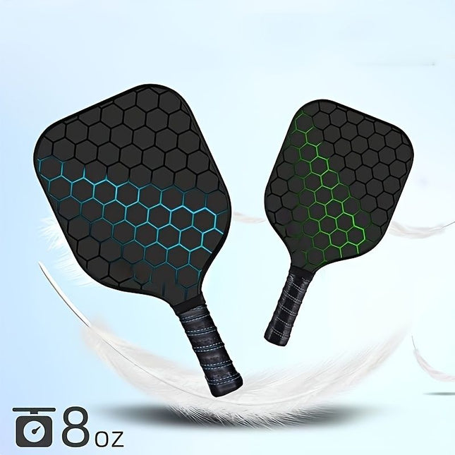 Pair of black pickleball paddles with hex mesh face, blue and green accents