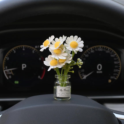 Car dashboard daisy flower decoration single glass vial with white daisies and yellow centers