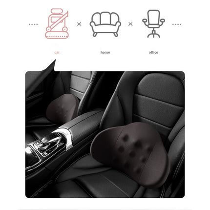 Black lumbar support cushion with tufted dimples shown on a car seat