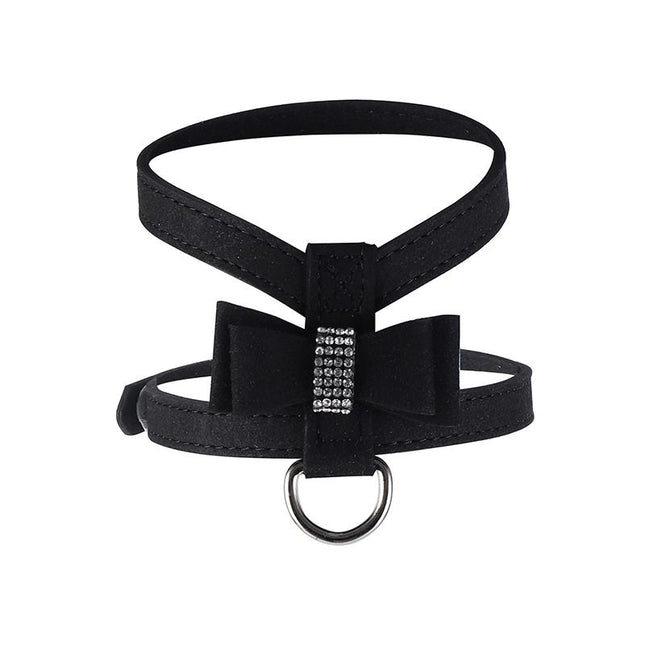 Black dog harness with front bow strap, rhinestone-style buckle, and metal D-ring