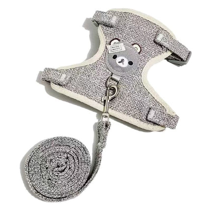 Adjustable bear chest harness in gray with bear face patch, metal rings, rolled strap