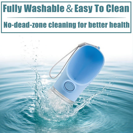 Blue pet water bottle splashing water into clear reservoir with drinking bowl