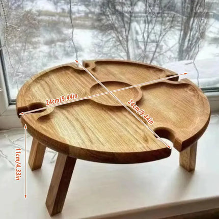 Wooden round folding picnic table with carved tray design and three legs, measured