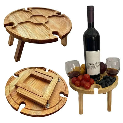 Round foldable wooden picnic table with tripod legs and serving tray center panel