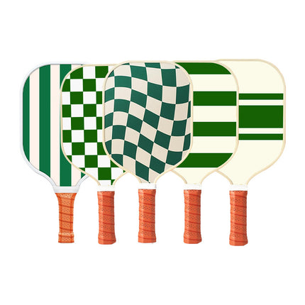 Set of white and green pickleball paddles with orange grips and checkered face.