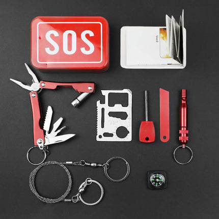 Red SOS survival multi-tool kit with tools and compass, shown with keyring