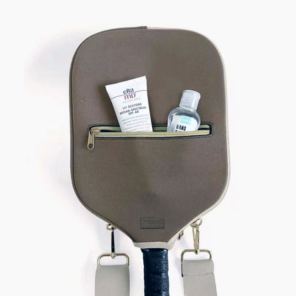 Gray zippered paddle cover with front pocket, inside items, and strap clips