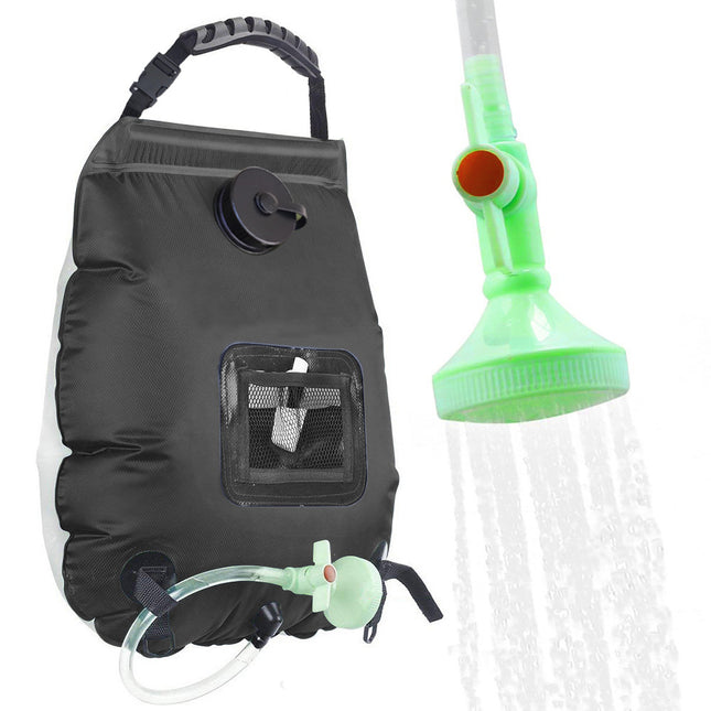 Black portable camping shower bag with shower hose, green shower head, and front mesh pocket
