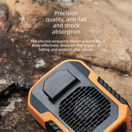 Orange portable fan close-up with top button and front vent grille