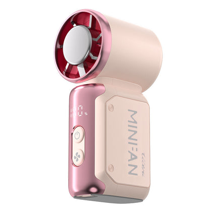 Pink mini handheld portable fan with circular front grille and side control buttons