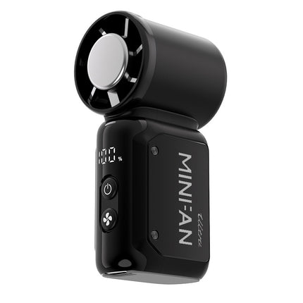 Black mini handheld fan with front grille, power button, and control panel