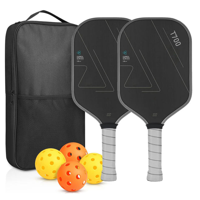 Pickleball paddle set with black carry bag, two dark paddles, and orange pickleballs