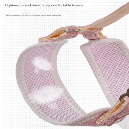 Close-up of pink mesh pet harness with soft padding and adjustable strap hardware