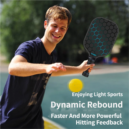 Pickleball paddle with dark honeycomb face and PU grip held for play, with yellow ball