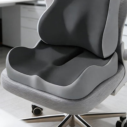 Black contoured seat cushion with lumbar support, shaped for buttock comfort