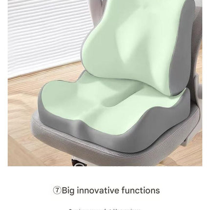 Light green ergonomic seat cushion with lumbar pillow and central cutout for comfort