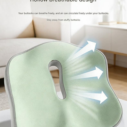 Light green seat cushion with U-shaped central cutout and contoured backrest support