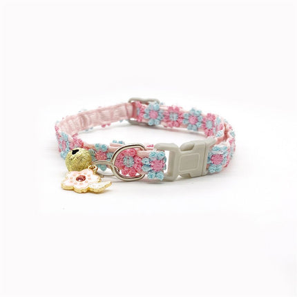 Pastel floral lace pet collar with decorative charm tag and adjustable buckle on white background